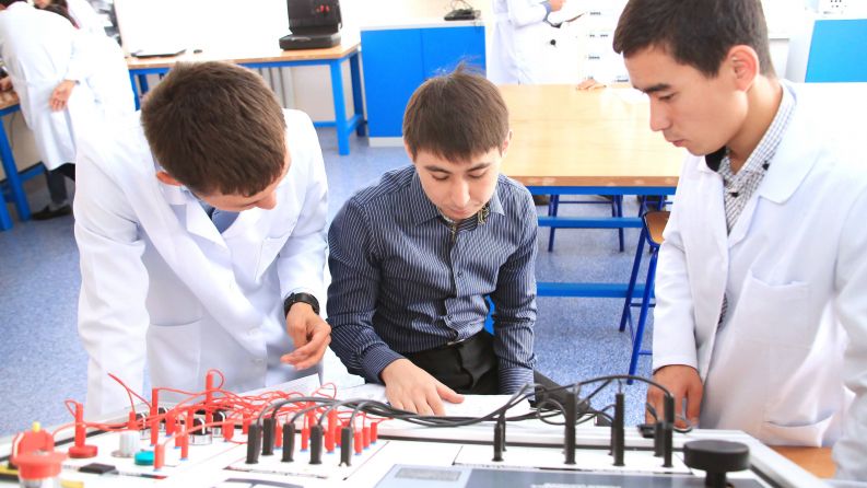 Satbayev University students at testing laboratory